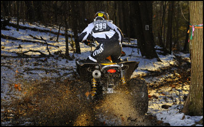 Rick Cecco kicking up some mud on his Can-Am Renegade 800R XC
