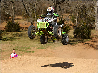 Logan Steele Jumps with John Natalie Watching